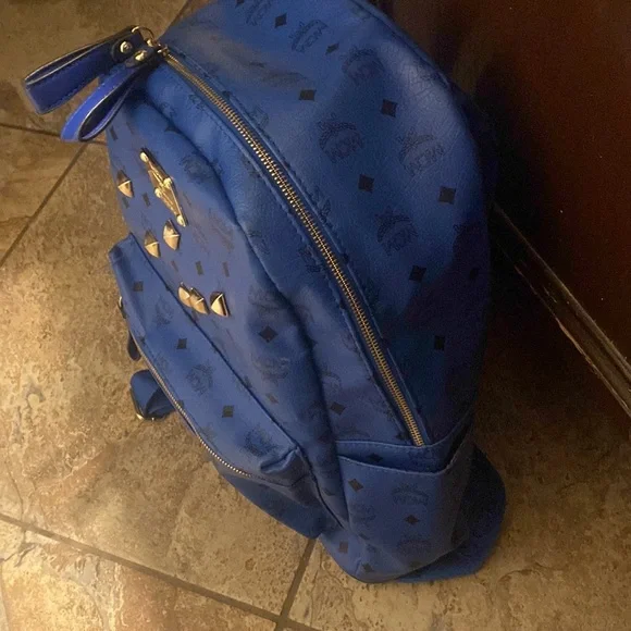 selling MCM backpack color is blue